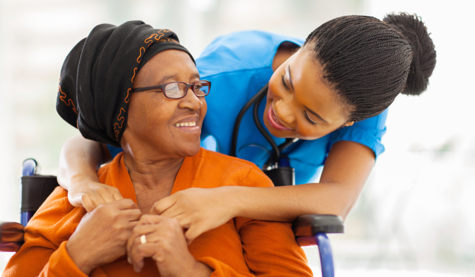 happy senior patient with friendly female nurse